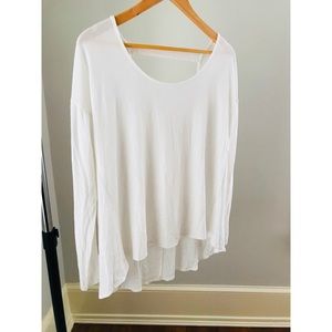 Long sleeve white top with low back cutout